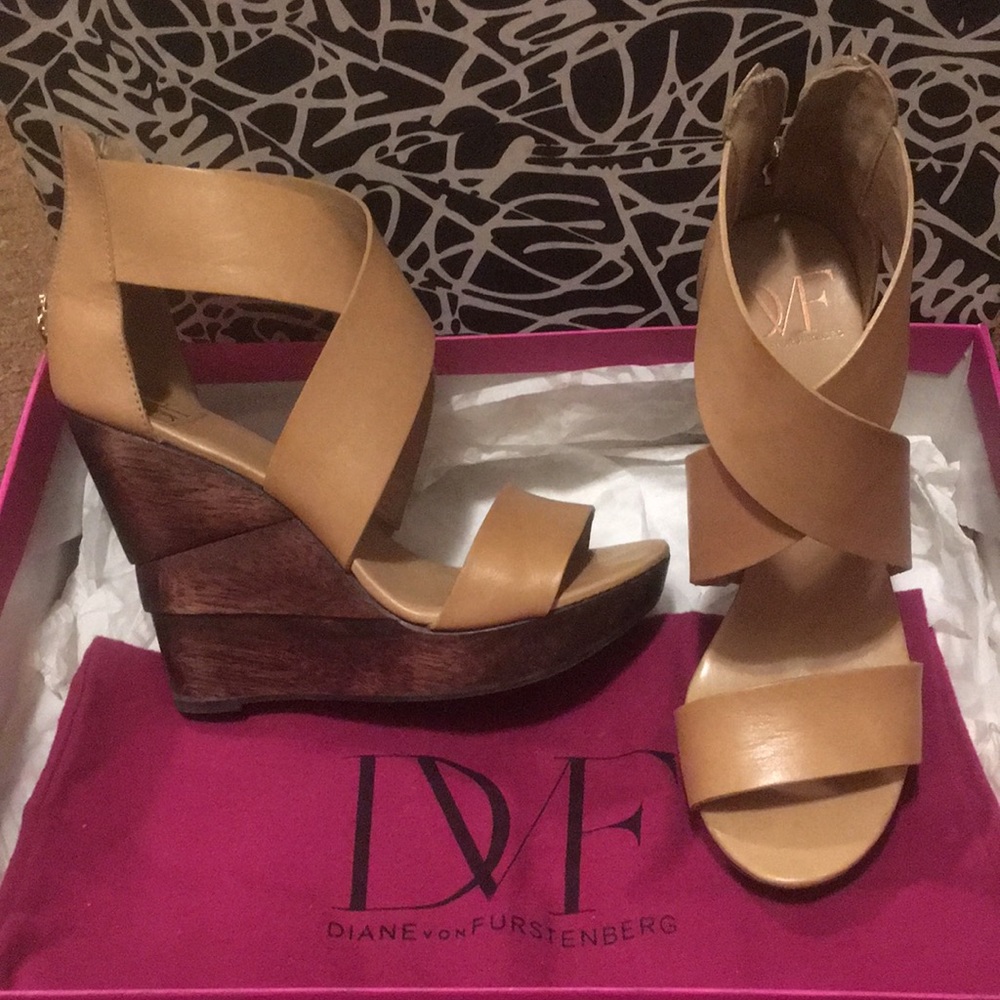 Diane von Furstenberg wood platform sandals.